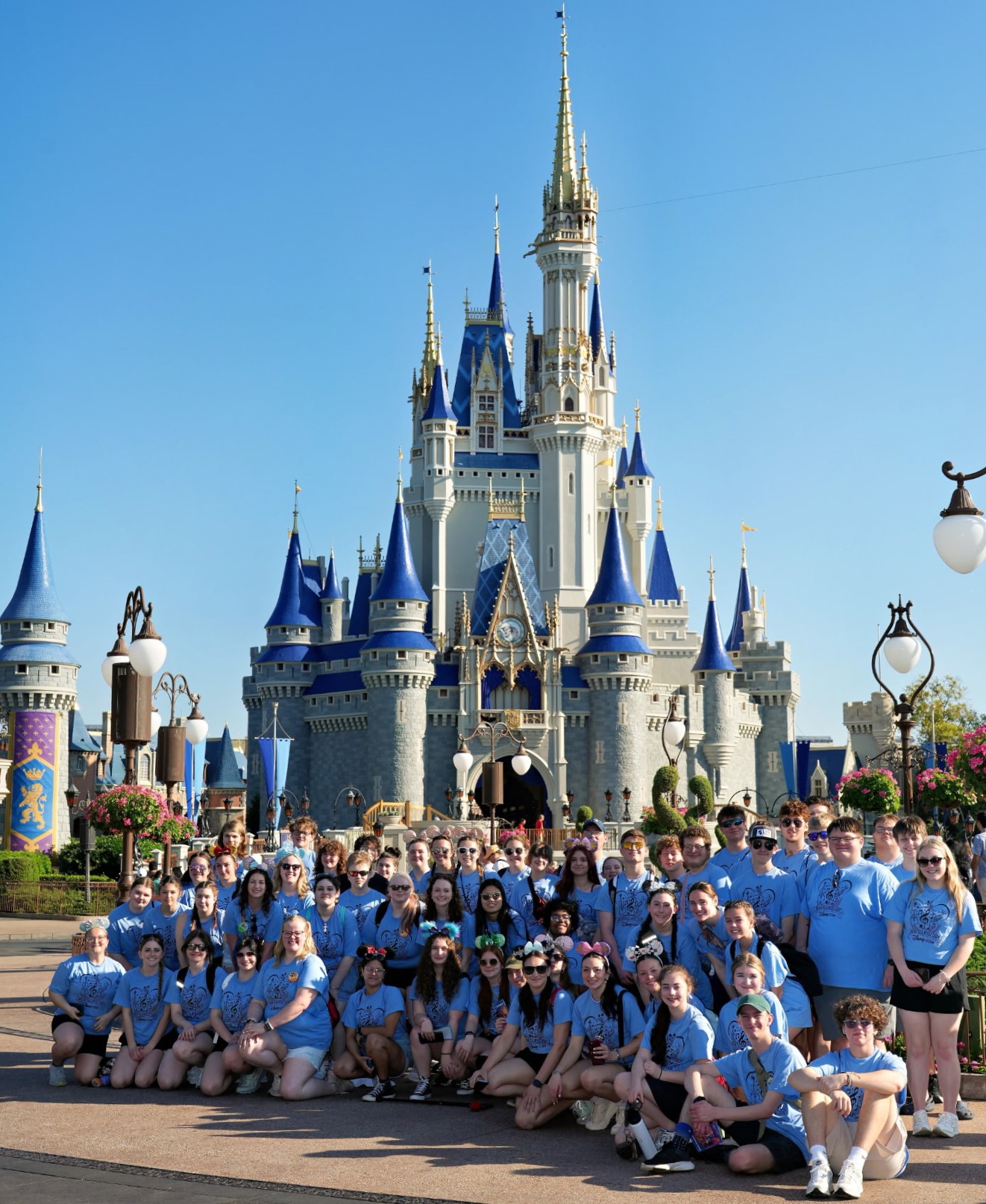 Students and staff from the BAHS music department pose for a group photo at the Magic Kingdom at Disney in Florida.